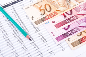 datasheet, Brazilian money and green pencil